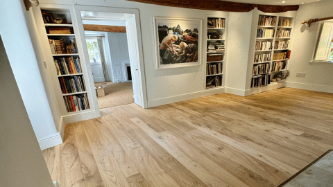 Lounge area of a home with newly installed wood flooring