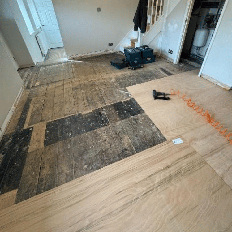 The process of installing engineered oak flooring with careful planned board layout