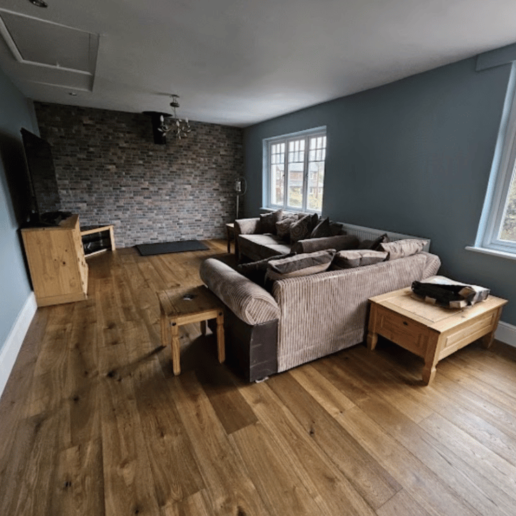 Finished oak floor installation in lounge
