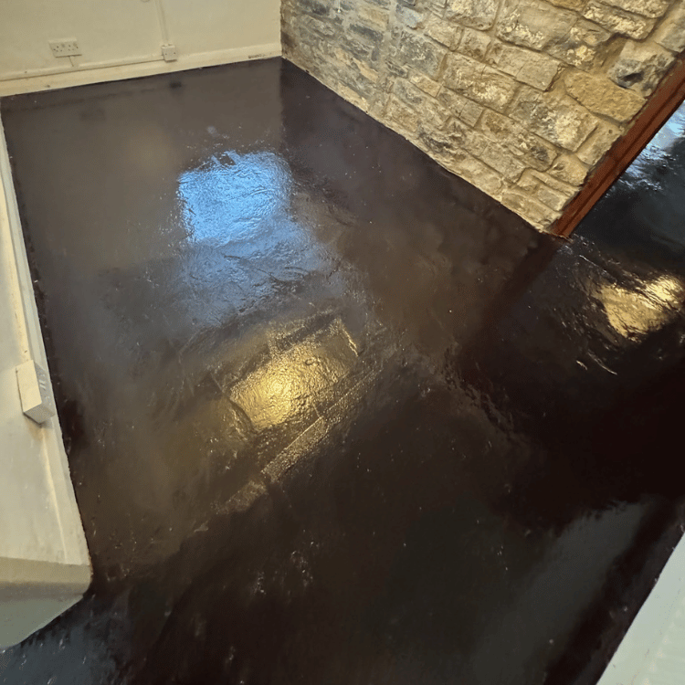 Applying Two-Part Epoxy Damp Proof Membrane