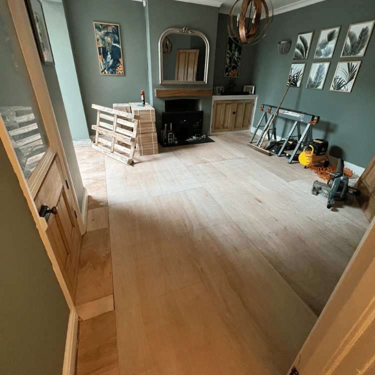 Fitting plywood sheeting across existing floorboards