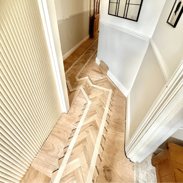 Installing Herringbone Flooring around a staircase